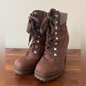 Steve Madden brown leather 4.5 inch heel boot with rugged sole.